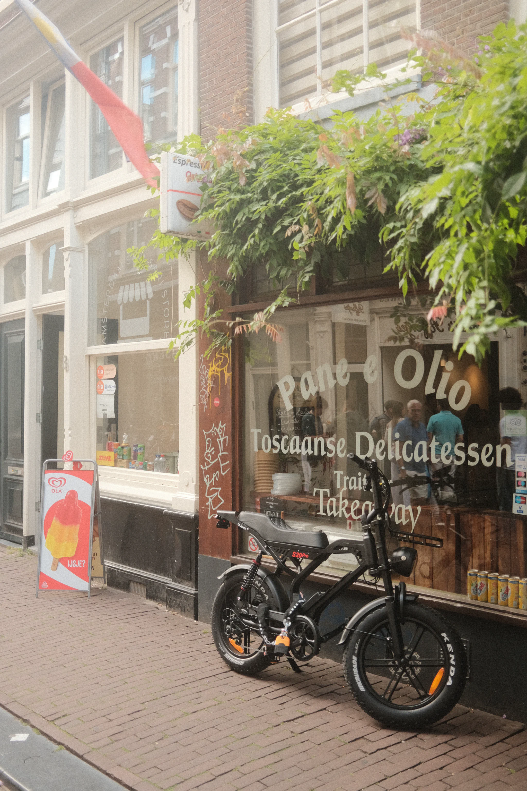 Deli storefront with bike leaning