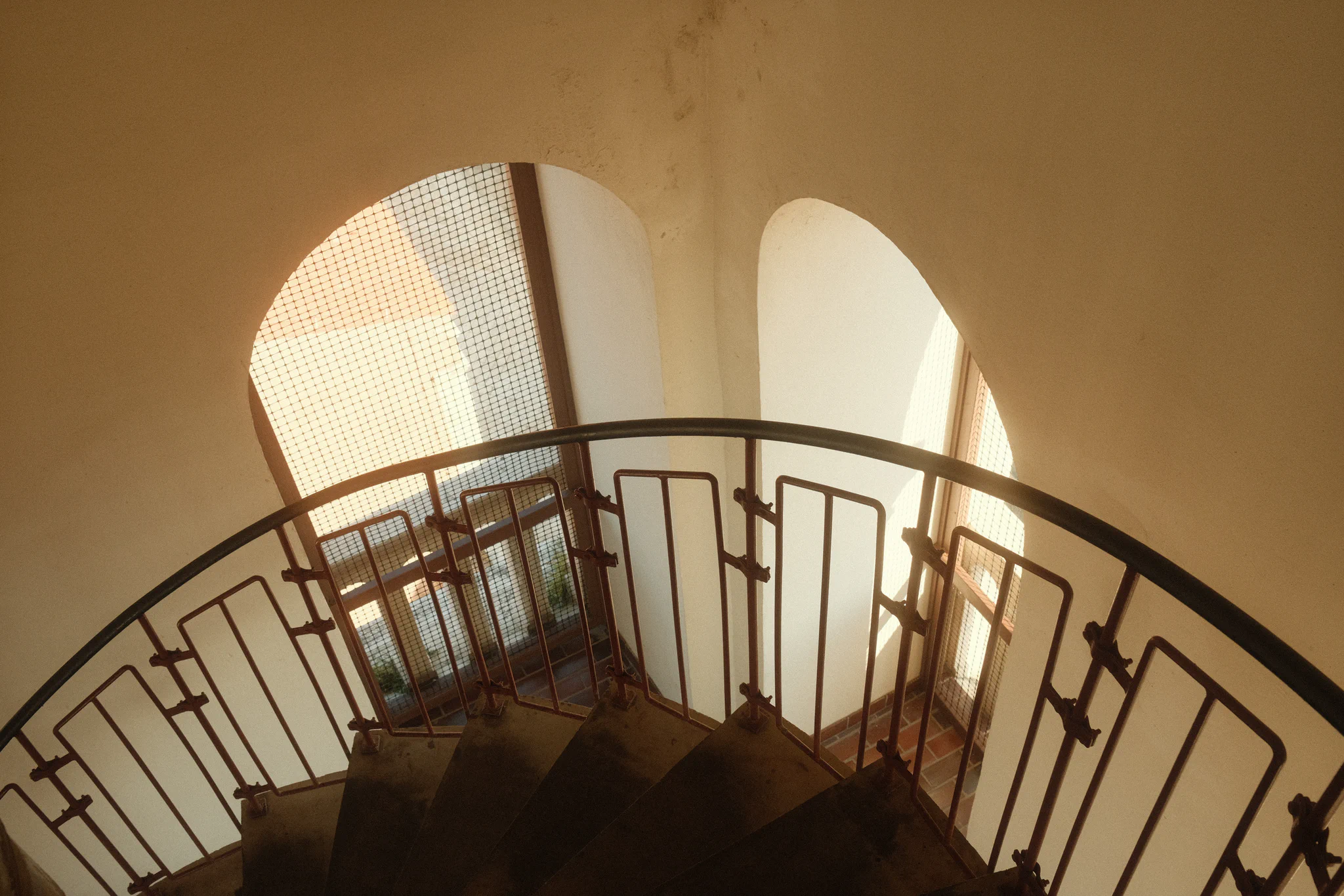 Spiral staircase arches