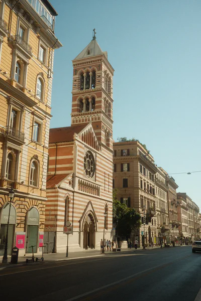 Striped church Rome with sunlight reflecting